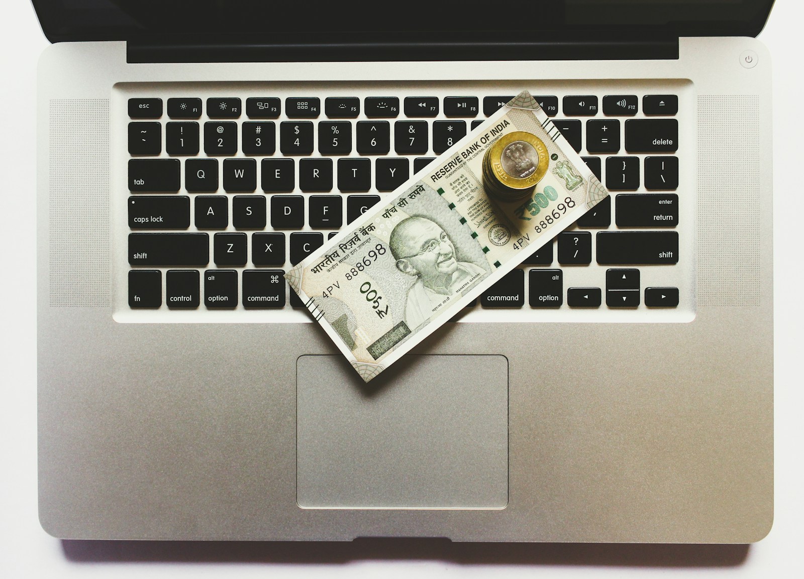 500 Indian rupee banknote on a laptop - Digital Lending