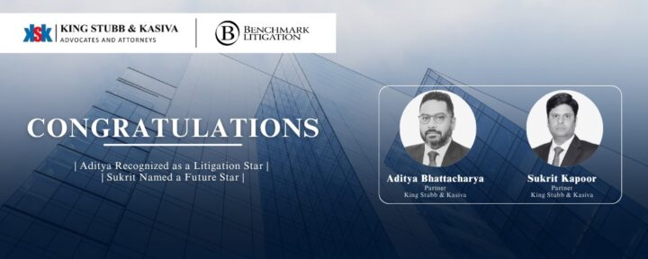 Professional discussing legal matters at King Stubb & Kasiva law firm office