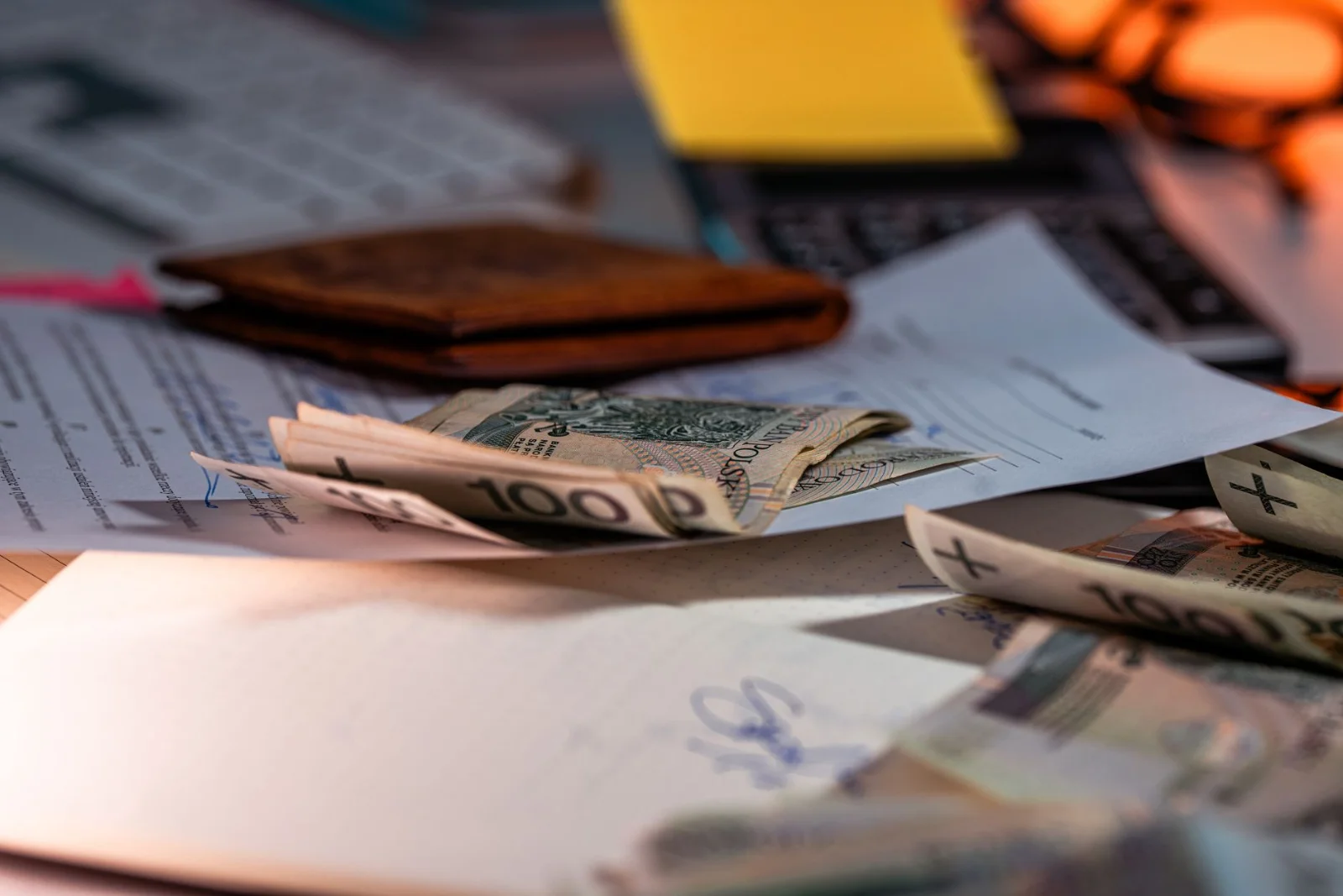 Can a Successful Resolution Applicant Walk - Zloty banknotes and financial paperwork scattered on a desk, representing budget