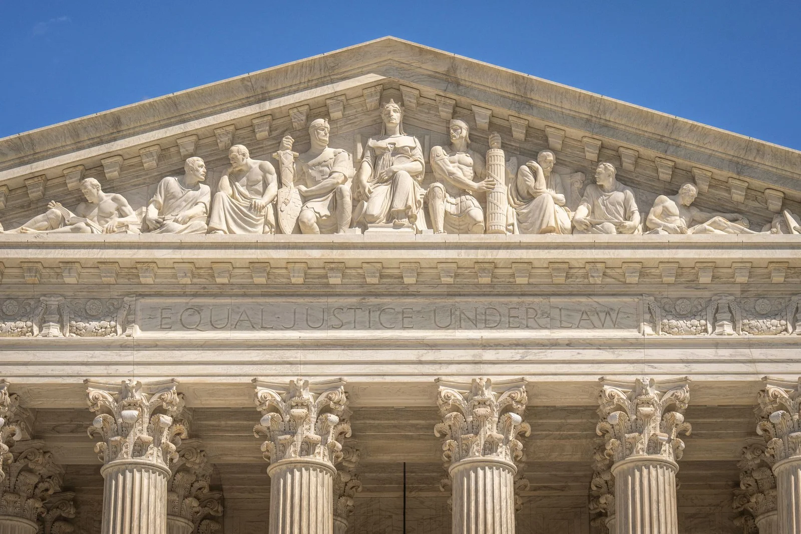 passive euthanasia in india - Passive - Detailed view of the Supreme Court Building's frontal frieze depicting historical fig