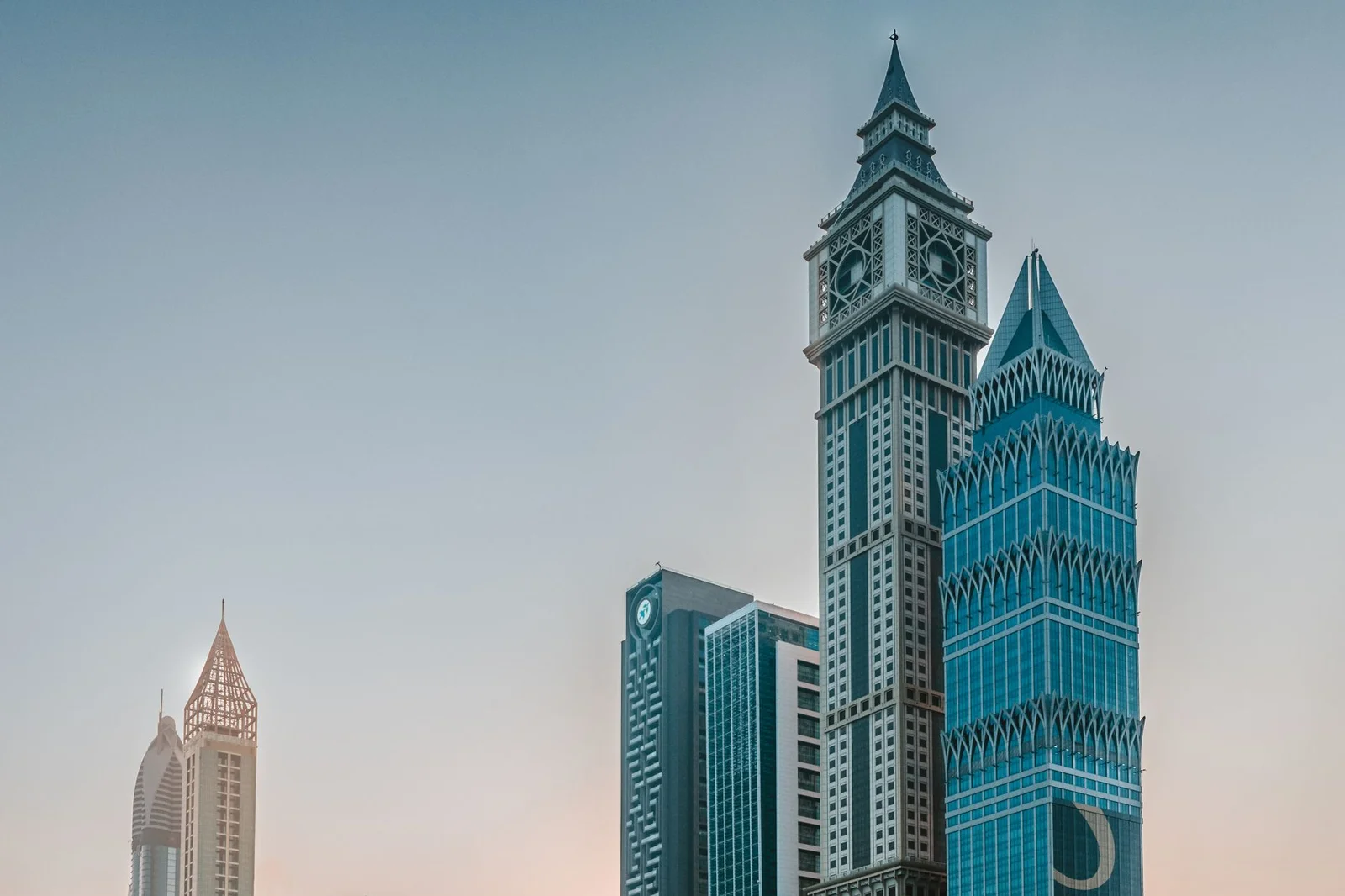 setting up gcc in india - - Stunning view of Dubai's skyline showcasing iconic skyscrapers against a blue sky.