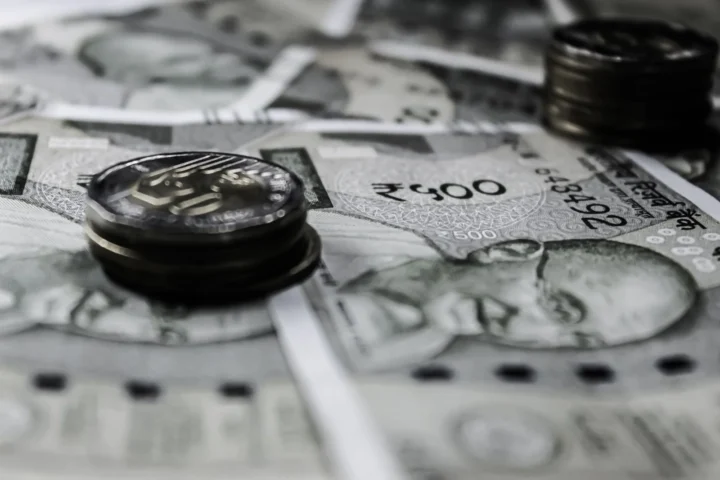 Indian currency notes and financial charts depicting the revival of foreign currency convertible bonds